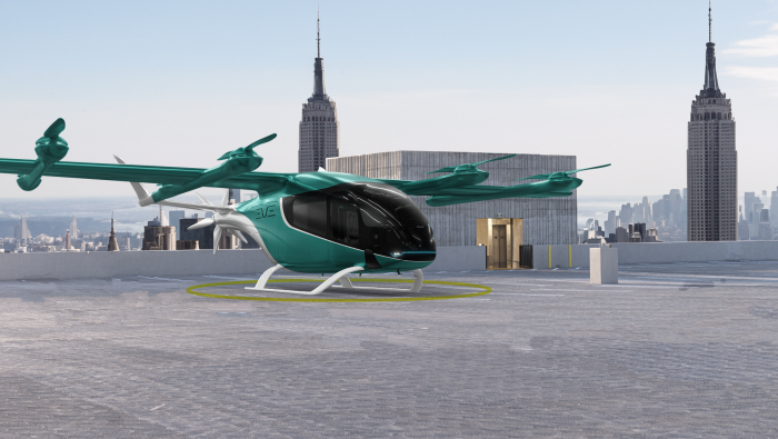 A digital rendering of Eve's eVTOL aircraft on a rooftop in New York City