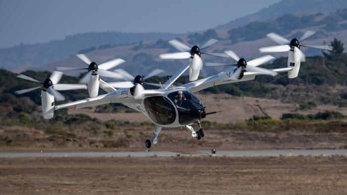 Joby experimental test pilot Zach Reeder flies the company's preproduction prototype eVTOL aircraft in Marina, California. 