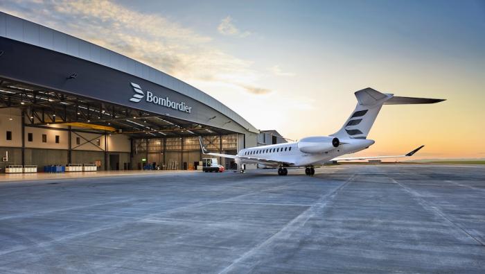 bombardier Global in front of hangar.