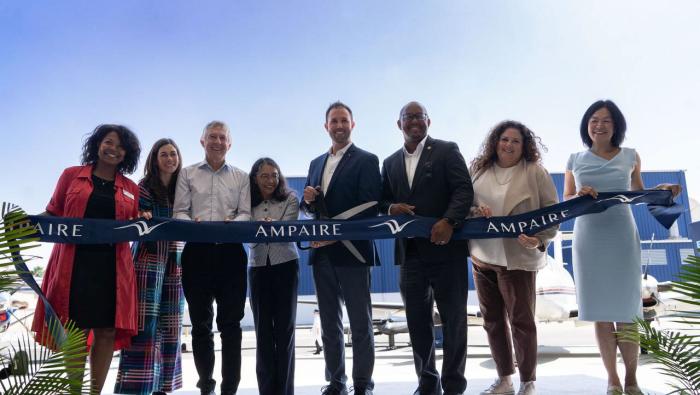 Ampaire CEO Kevin Noertker cuts the ribbon outside the company's new Long Beach headquarters during the grand opening ceremony on Aug. 27, 2024.