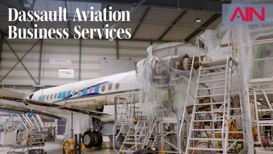 Dassault Falcon aircraft undergoing maintenance in hangar