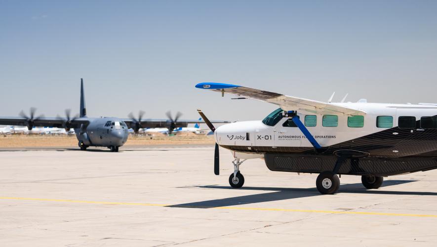 Joby's autonomous Cessna 208b Grand Caravan is pictured with a C-130 Hercules at the Mojave Air and Space Port in California during the Agile Flag 24-3 exercise. 