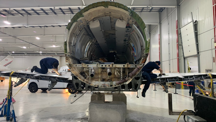 Aircraft undergoing disassembly