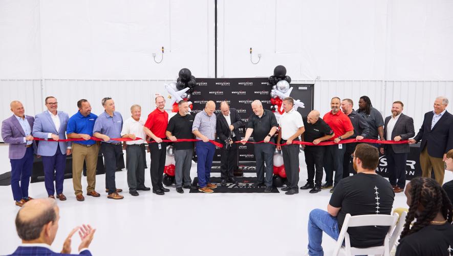 Ribbon cutting on new West Star hangar at KALN