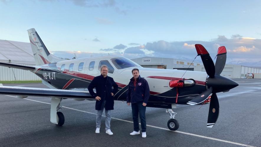 Paolo Buzzi and Pierre Alain Chevallaz with Daher TBM 960 airplane