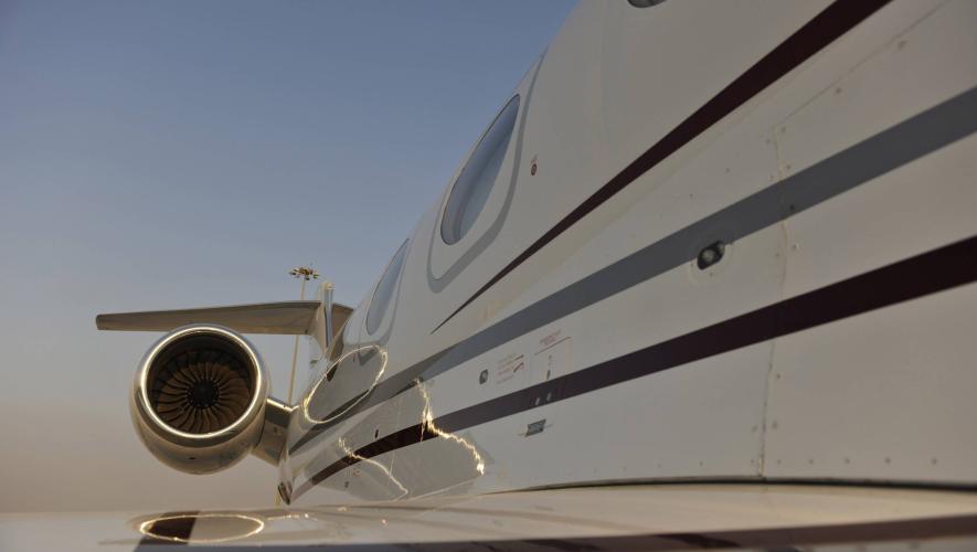 side view of business jet looking toward engine