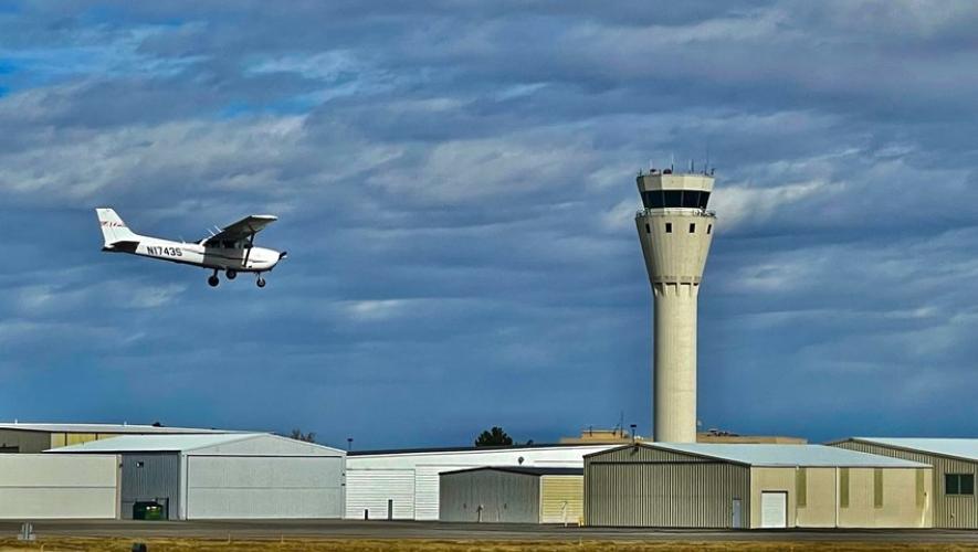 Cessna 172S in flight over airfield at Centennial Airport 
