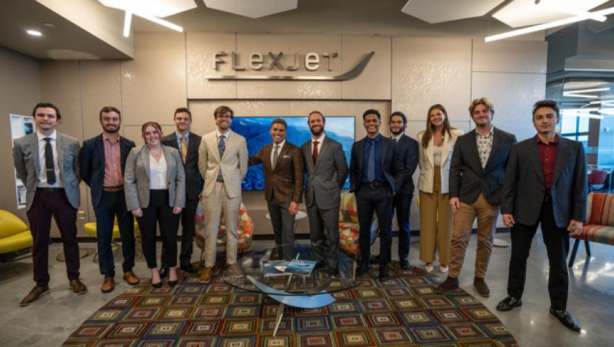 Flexjet chairman Kenn Ricci (center left) and Michael Campobasso (right), manager of Flexjet Innovation Center.