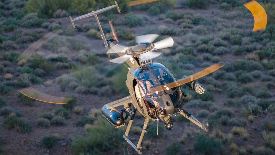 A Cayuse Warrior Plus helicopter is pictured in flight.
