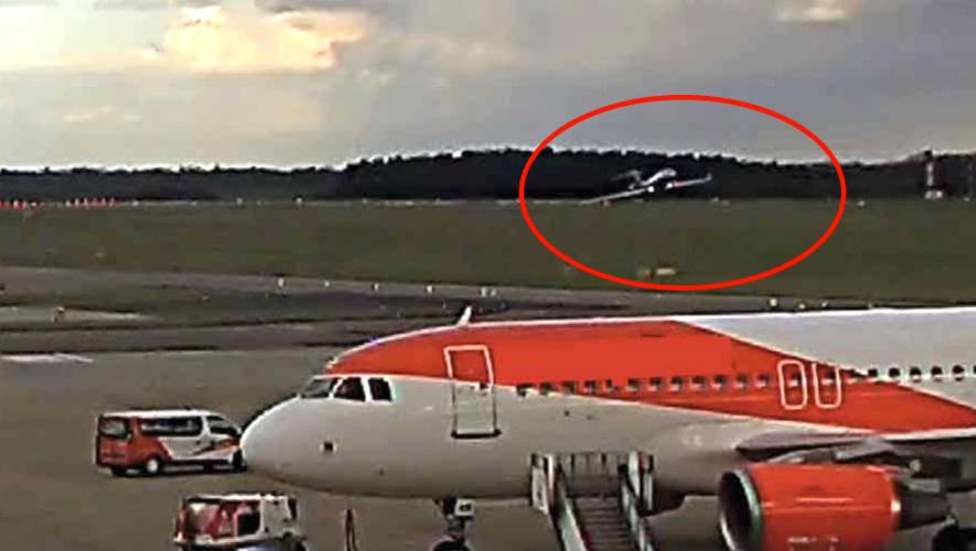 Redacted CCTV image of LX-NST wing contacting the ground
