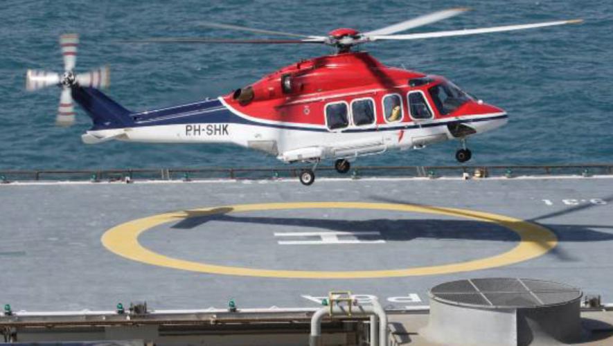 Helicopter landing on offshore helipad