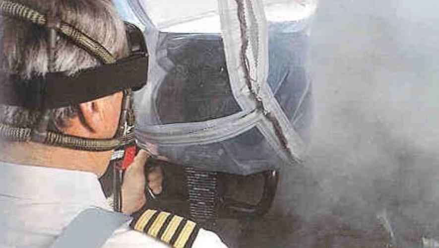 VisionSafe EVAS system worn by pilot in smoke filled cockpit simulation