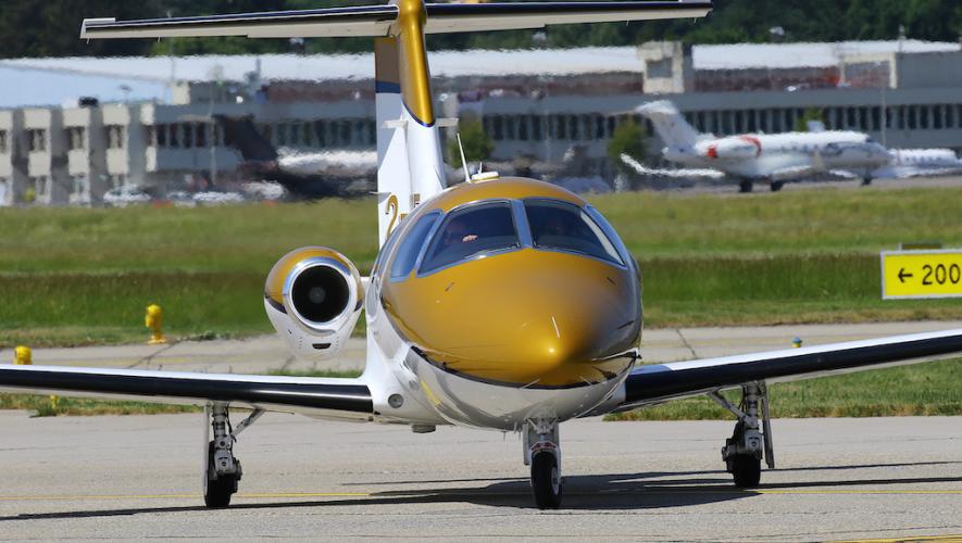 business jet on airport taxiway