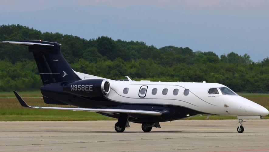 Embraer Phenom 300 on airport taxiway