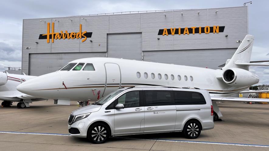 Harrods Aviation hangar with private jet and electric van