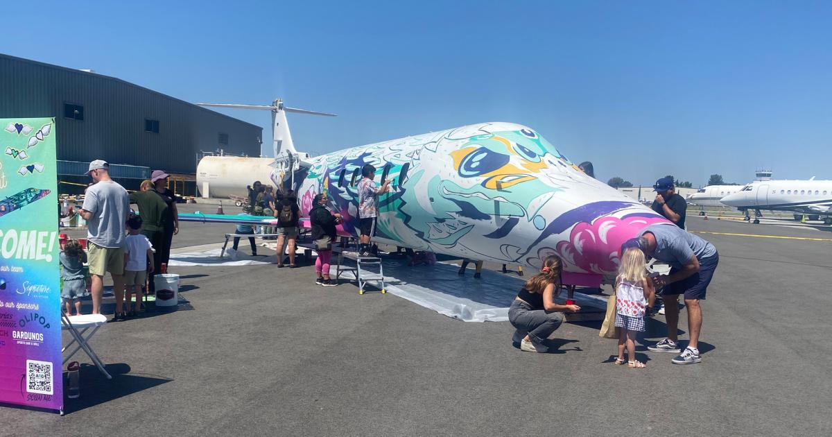 Learjet 60 being converted into a mural at Van Nuys Airport in California