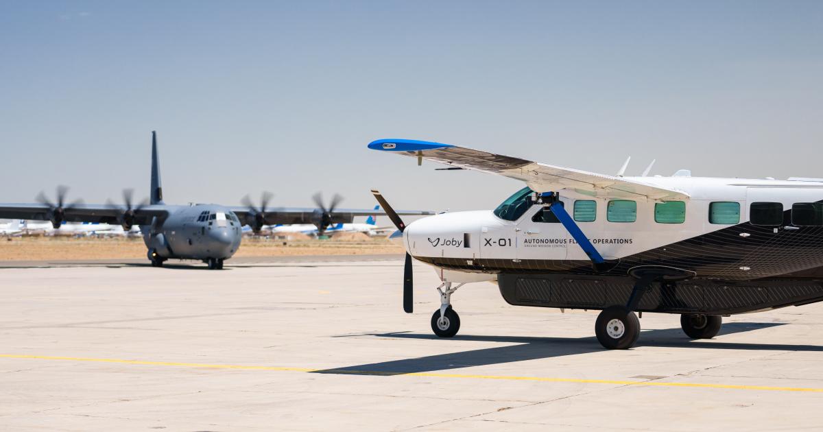 Joby's autonomous Cessna 208b Grand Caravan is pictured with a C-130 Hercules at the Mojave Air and Space Port in California during the Agile Flag 24-3 exercise. 