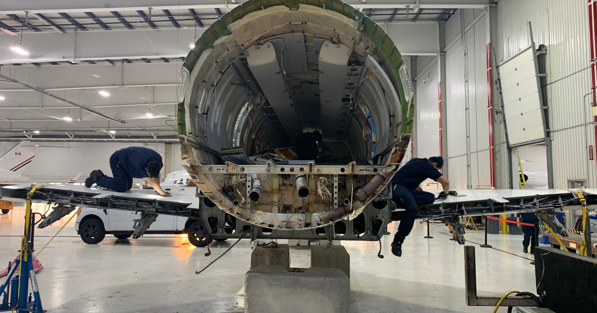 Aircraft undergoing disassembly