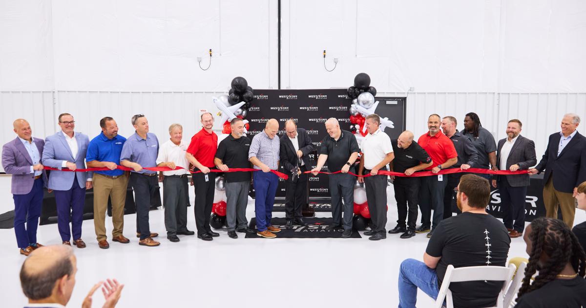 Ribbon cutting on new West Star hangar at KALN