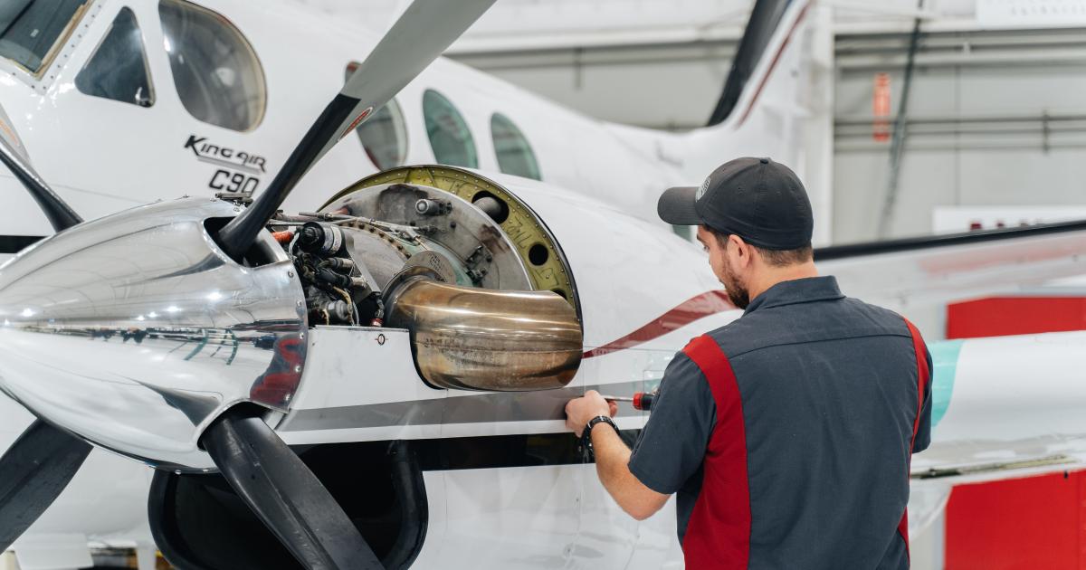 Stevens Aerospace technician working on airplane