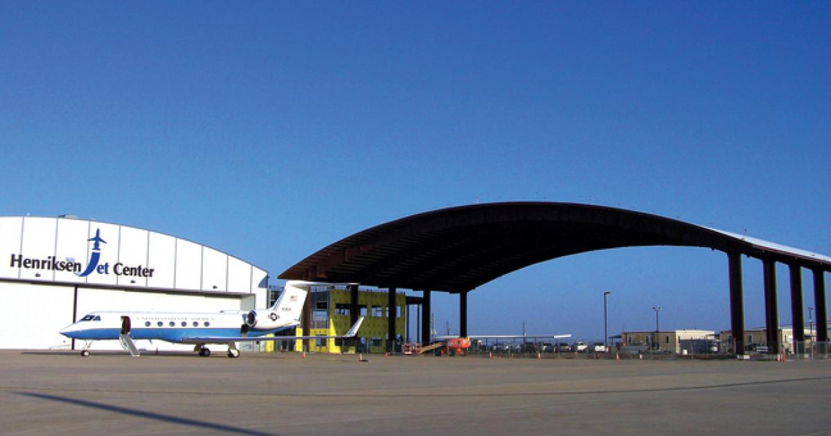 The 32,800-sq-ft canopy at Houston’s Henriksen Jet Center can provide shelter for two  BBJs parked side by side.