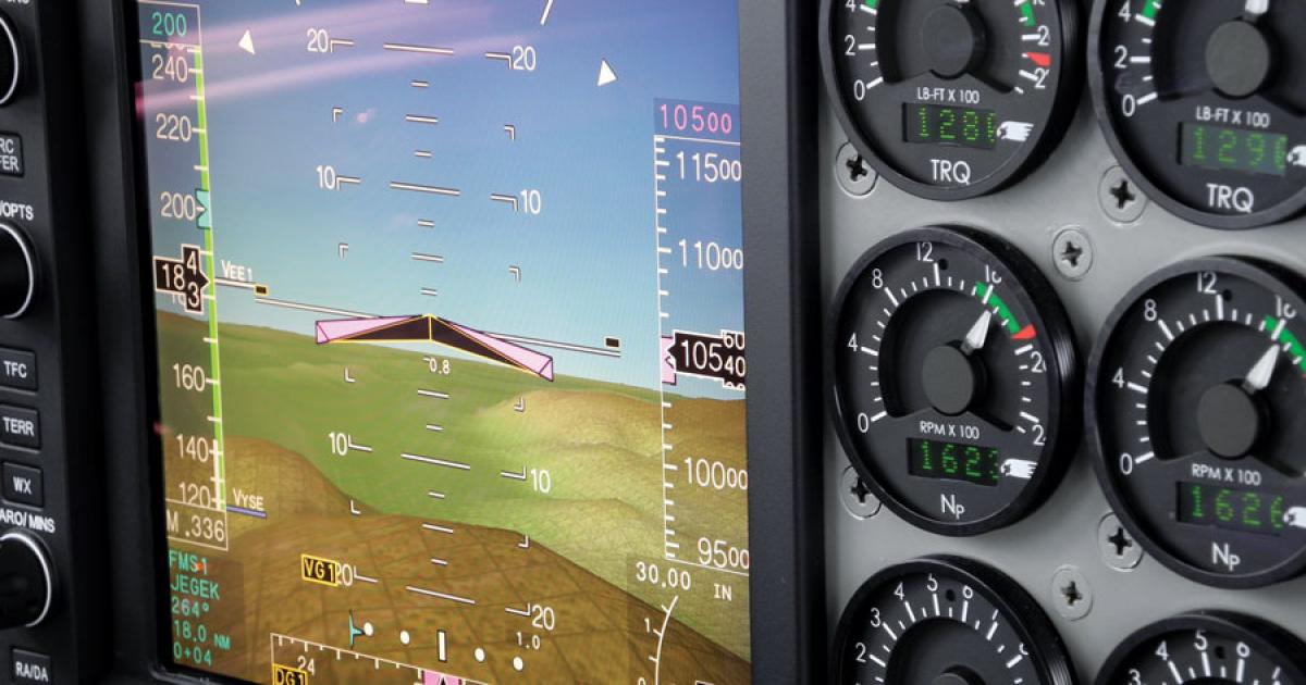 A flight over mountainous terrain near the Universal Avionics headquarters in Tucson, Ariz., shows off the company’s synthetic vision system on an  EFI-890R display. 