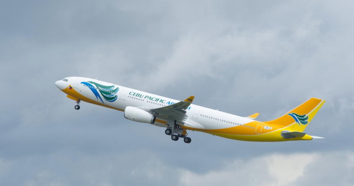 Asian operators of the Airbus A330, such as Philippines-based Cebu Air, have used their aircraft to carry more than 400 passengers, prompting the manufacturer to consider a new "regional" variant to operate at a lower weight. (Photo: Airbus)    