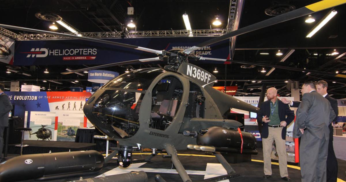 MD Helicopters not only unveiled the MD 530g armed aerial scout here at Heli-Expo but also said it is already flying and will be certified this year. (Photo: Mariano Rosales)