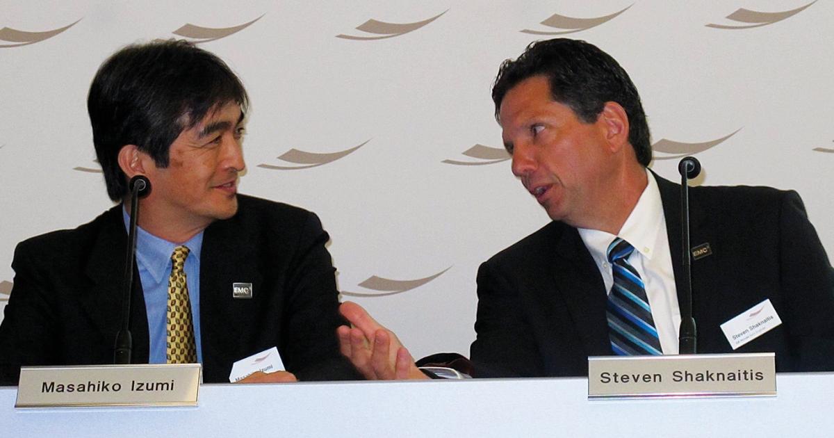 GE Honda executive v-p Masahiko Izumi, left, shares the head table with company president Steven Shaknaitis during an EBACE press conference.