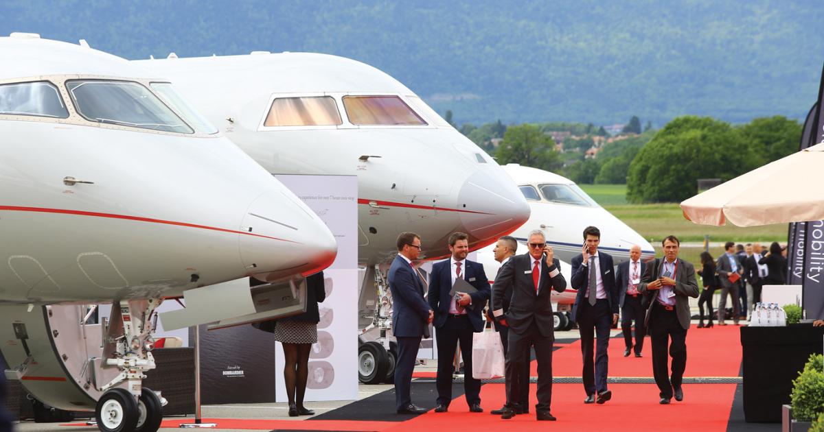 The EBACE static display area is not short on aeronautical eye candy. And it stands to reason that you’ll want to share the news with your mobile phone. (Photo: David McIntosh/AIN)