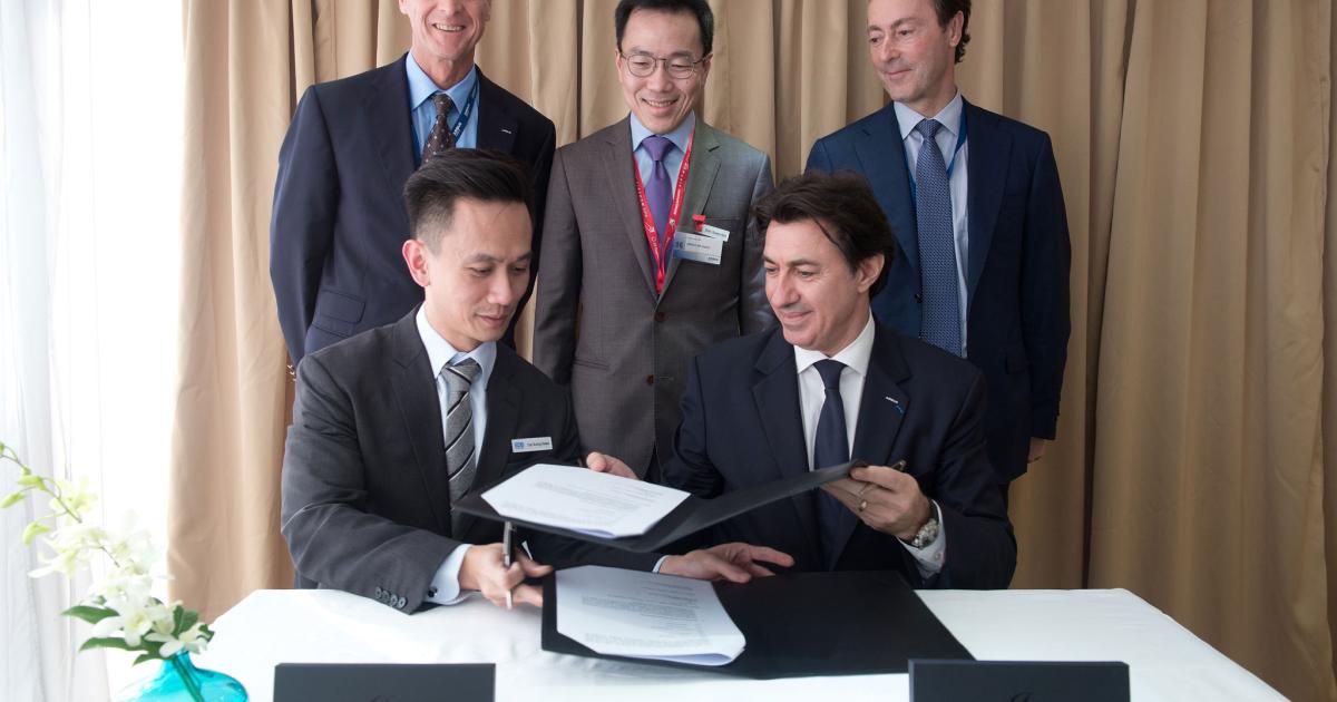 Airbus Group signs MoU with Singapore’s Economic Development Board (EDB) to develop aircraft maintenance of the future. From left to right, seated: Tan Kong Hwee, EDB director of transport engineering; and Pierre Jaffre, president Asia-Pacific at Airbus Group. From left to right, standing: Tom Enders, Airbus Group CEO; Beh Swan Gin, EDB chairman; and Fabrice Brégier, president and CEO of Airbus.