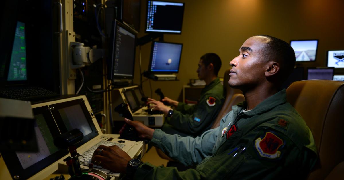 An MQ-9 Reaper pilot with 432nd Aircraft Maintenance Squadron controls aircraft from Creech Air Force Base. (Photo: U.S. Air Force)