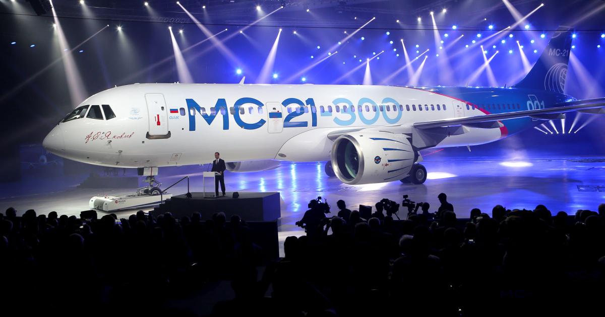 Russian Prime Minister Dmitry Medvedev addresses a crowd of well-wishers following the unveiling of the first MC-21 narrowbody. 