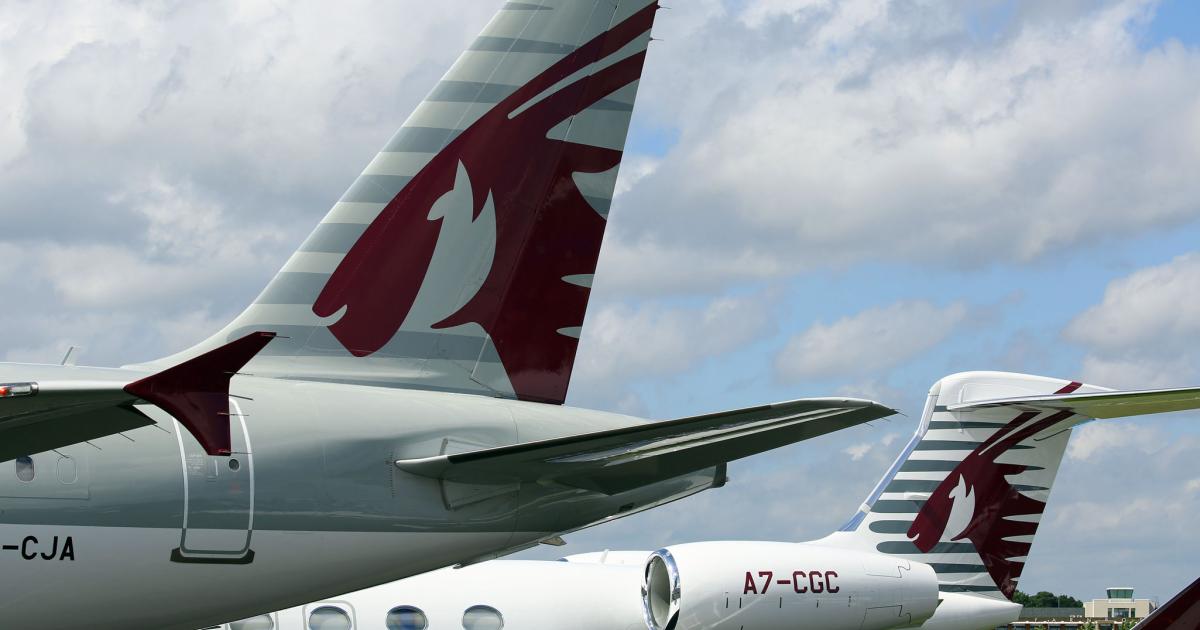 Qatar Airways’ distinctive livery soon will be applied to three more Gulfstream G650ERs, (background), thanks to a new order announced yesterday here at Farnborough.