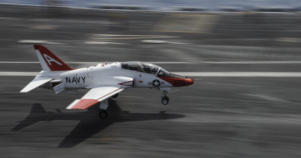 A T-45 Goshawk performs a touch and go exercise on the deck of the aircraft carrier USS Theodore Roosevelt. (Photo: U.S. Navy)