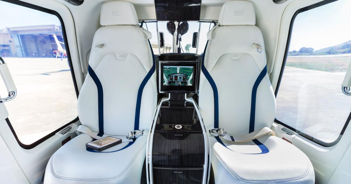 Mecaer Aviation Group’s Bell 429 interior shows off the company’s expertise in interior panels, headliner and passenger service controls. Now available in fixed-wing aircraft, the infotainment suite can include Wi-Fi, moving maps, ambient light and audio/video function controls. Company logos can be stitched into seats.