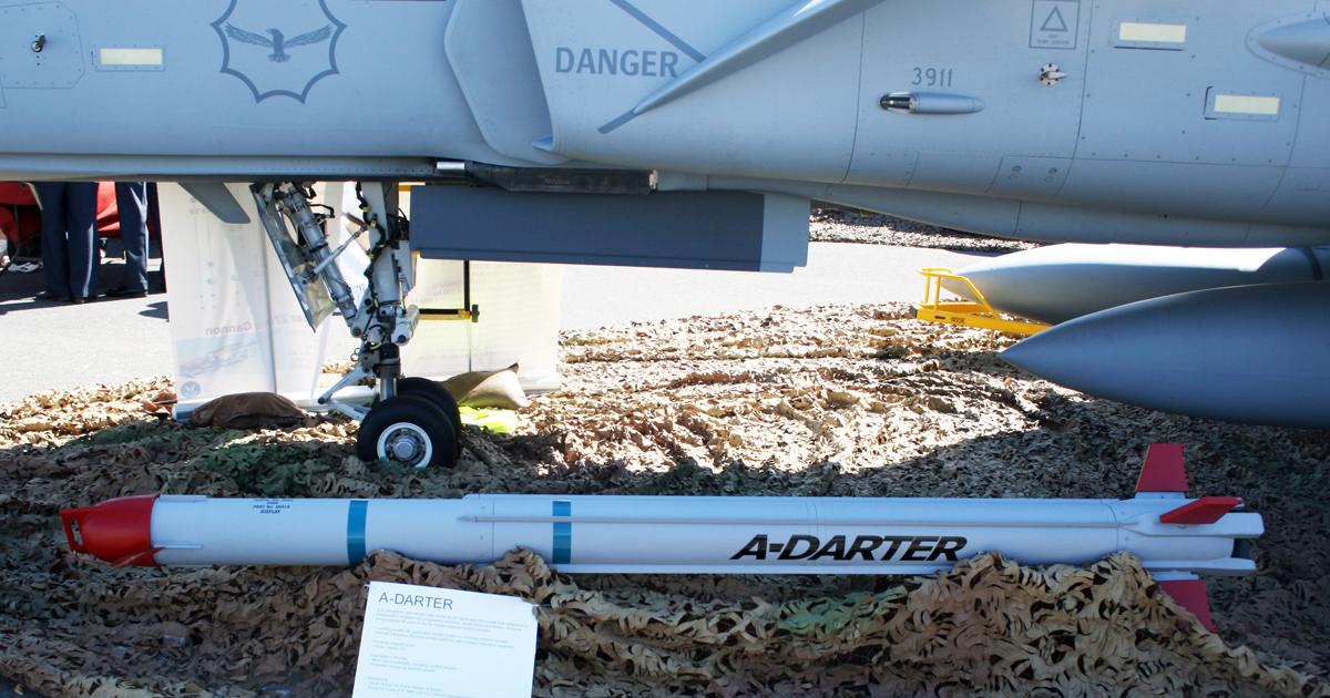 A mock-up of an A-Darter is shown next to a South African Air Force Gripen. The missile has some similarities to the Iris-T that is currently used by the SAAF Gripens, but is considerably larger. (photo: David Donald)