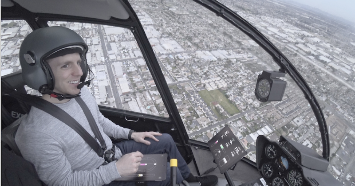 Skyryse CEO Mark Groden tests the company's new FlightOS automation system in a Robinson R-44 helicopter. [Photo: Skyryse]