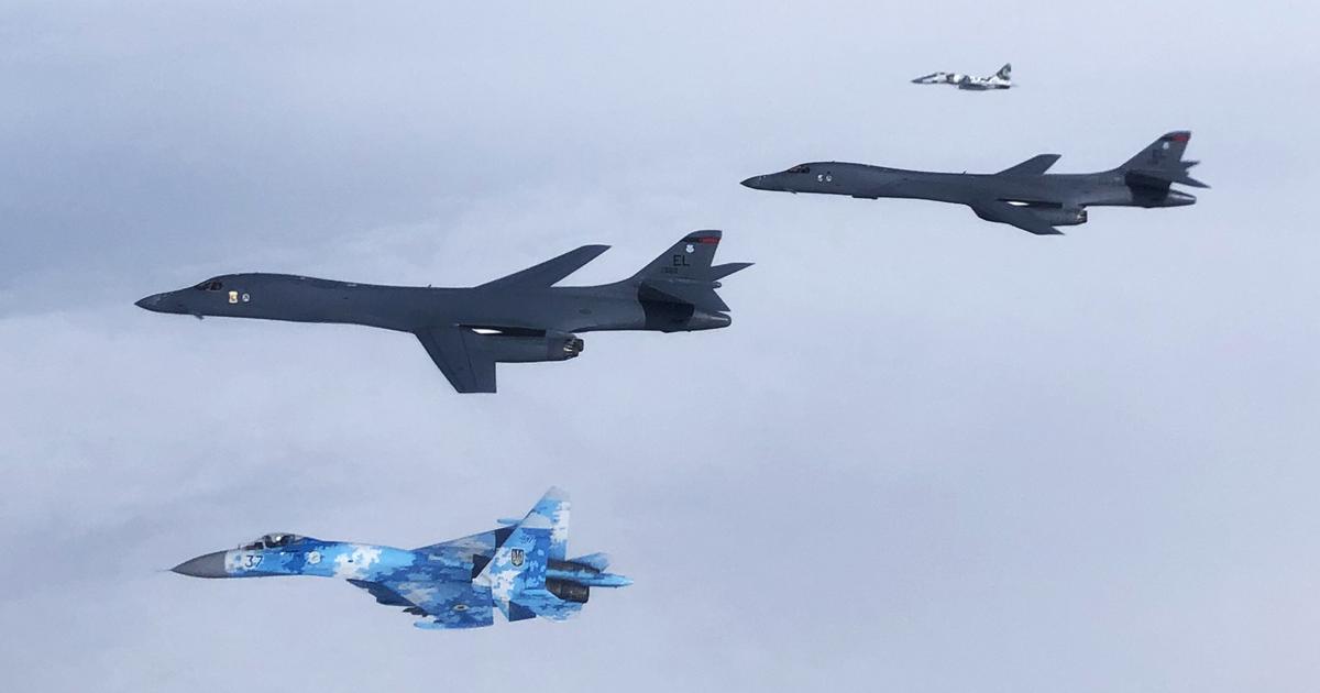 Old foes become friends: two 28th Bomb Wing B-1Bs work with Ukrainian Su-27 and MiG-29 fighters over the Black Sea on May 29. (Photo: Ukrainian air force)