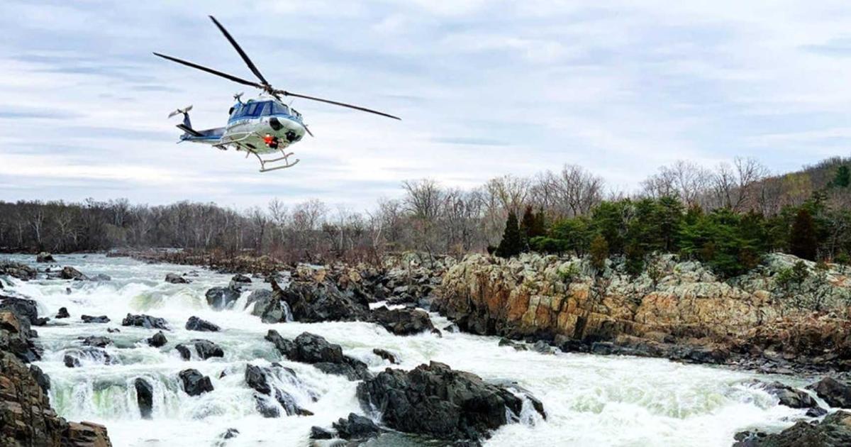 The U.S. Park Police flying over the Potomac River.