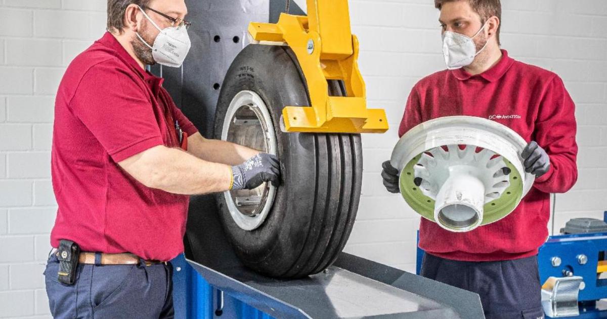 DC Aviation technicians inspect an aircraft wheel at the company's expanded wheel shop. (Photo: DC Aviation)