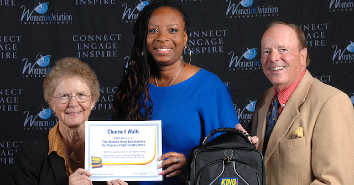 King Schools founders Martha and John King congratulate Charnell Walls, who was awarded the Women in Aviation International Martha King Scholarship for Women Flight Instructors. (Photo: King Schools)