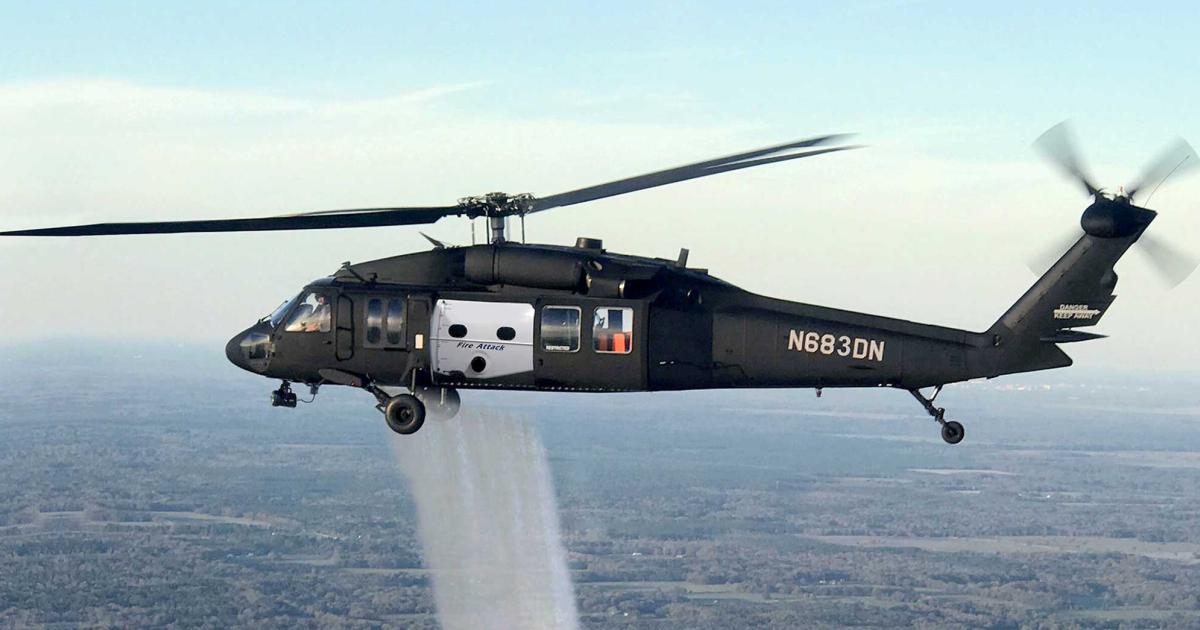 The Rogerson Kratos Top Drop conversion of the Black Hawk costs about one-third of the price of a new fire-fighting helicopter.