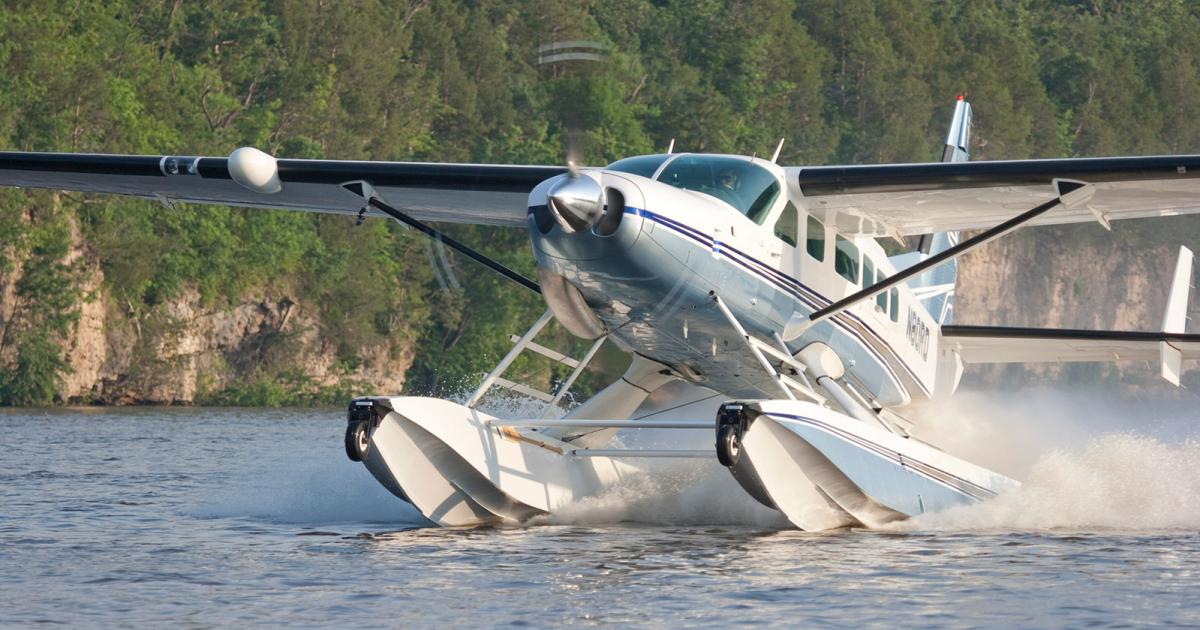 A Cessna Grand Caravan EX equipped with Wipaire's Wipline floats takes off from the water. (Photo: Wipaire)