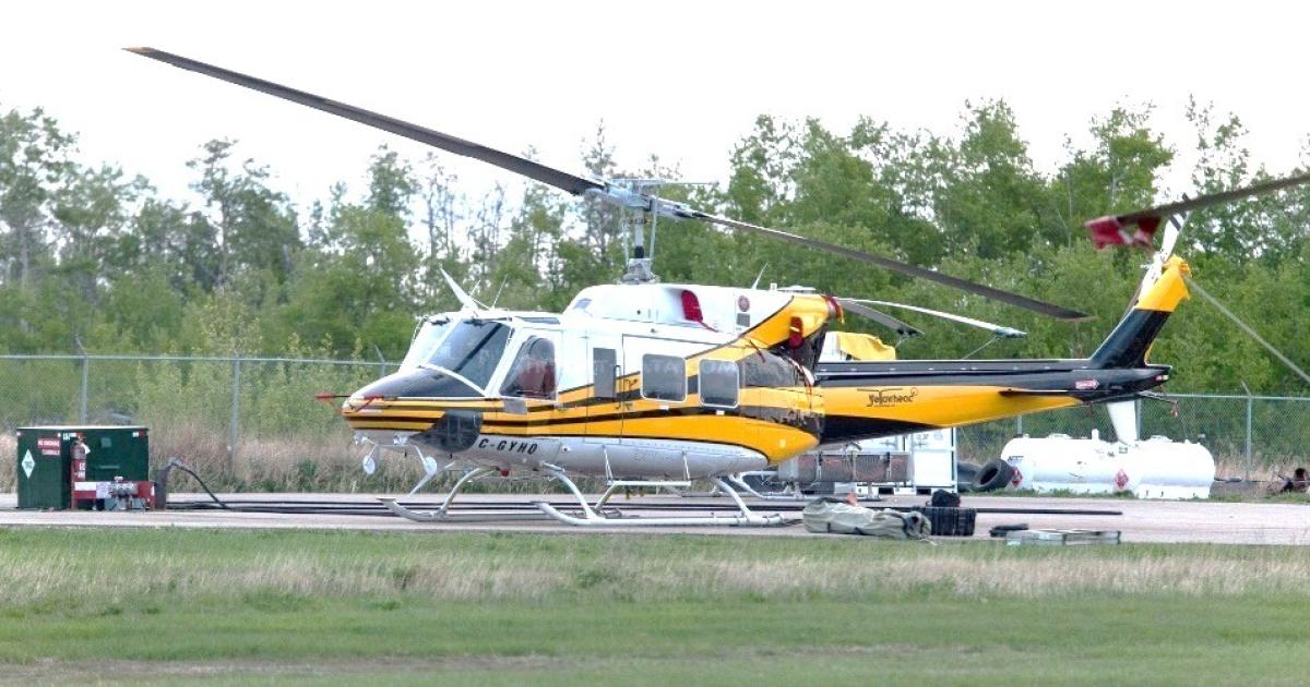 The fatal crash of this 1979 Bell 212 helicopter has been linked to the failure of a main rotor blade hub strap retaining pin, according to Canada’s Transportation Safety Board. (Photo: TSB)