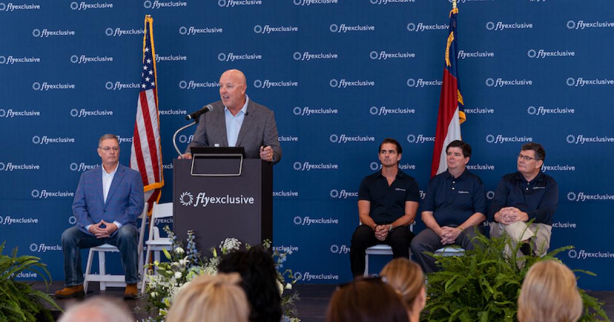FlyExclusive founder and CEO Jim Segrave speaks during a grand opening yesterday of the company's new maintenance hangar. (Photo: FlyExclusive)