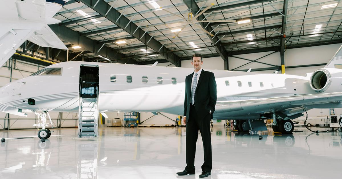 Sun Air Jets president and CEO Brian Counsil stands in one of the company's new hangars at Los Angeles-area Van Nuys Airport during the recent grand opening event. The latest additions bring the company to more than 100,000 sq ft of space at the airport to accommodate its managed aircraft and maintenance facility. (Photo: Sun Air Jets) 