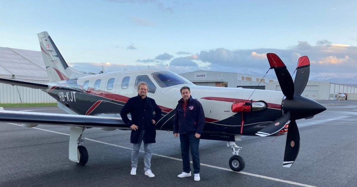 Paolo Buzzi and Pierre Alain Chevallaz with Daher TBM 960 airplane