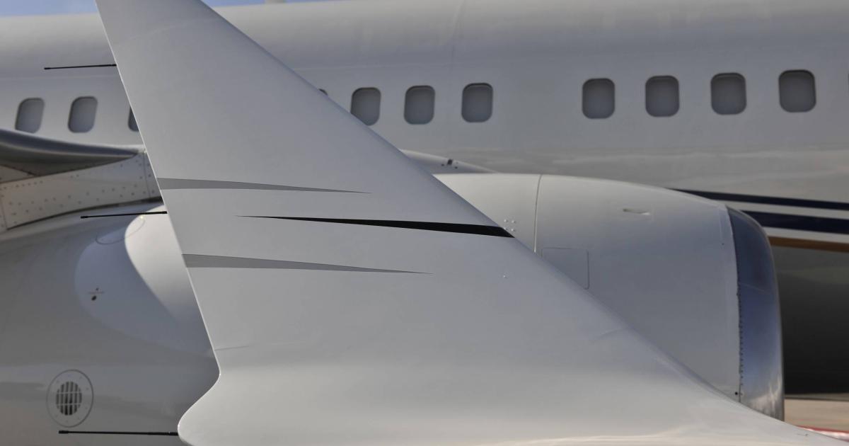 partial image of business jets on airport ramp