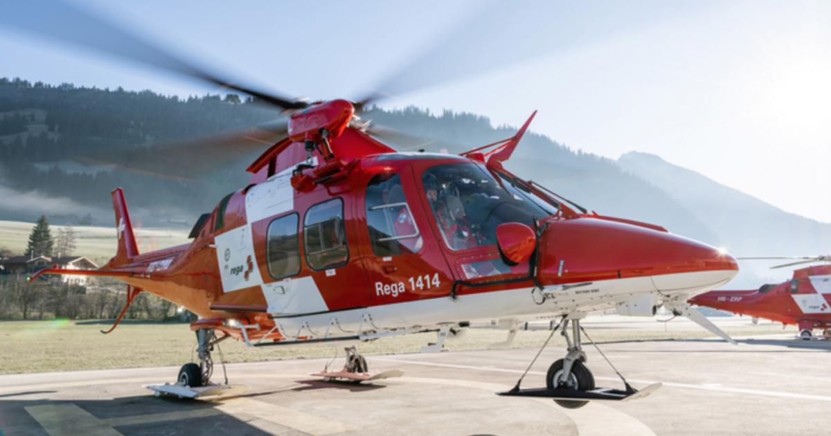 Swiss Air Rescue Rega air ambulance helicopter lifts off from helipad